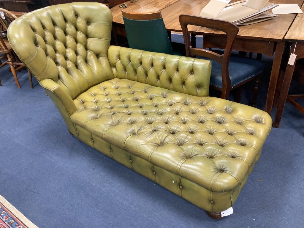 A Victorian style daybed upholstered in buttoned green leather, length 170cm, width 70cm, height 82cm